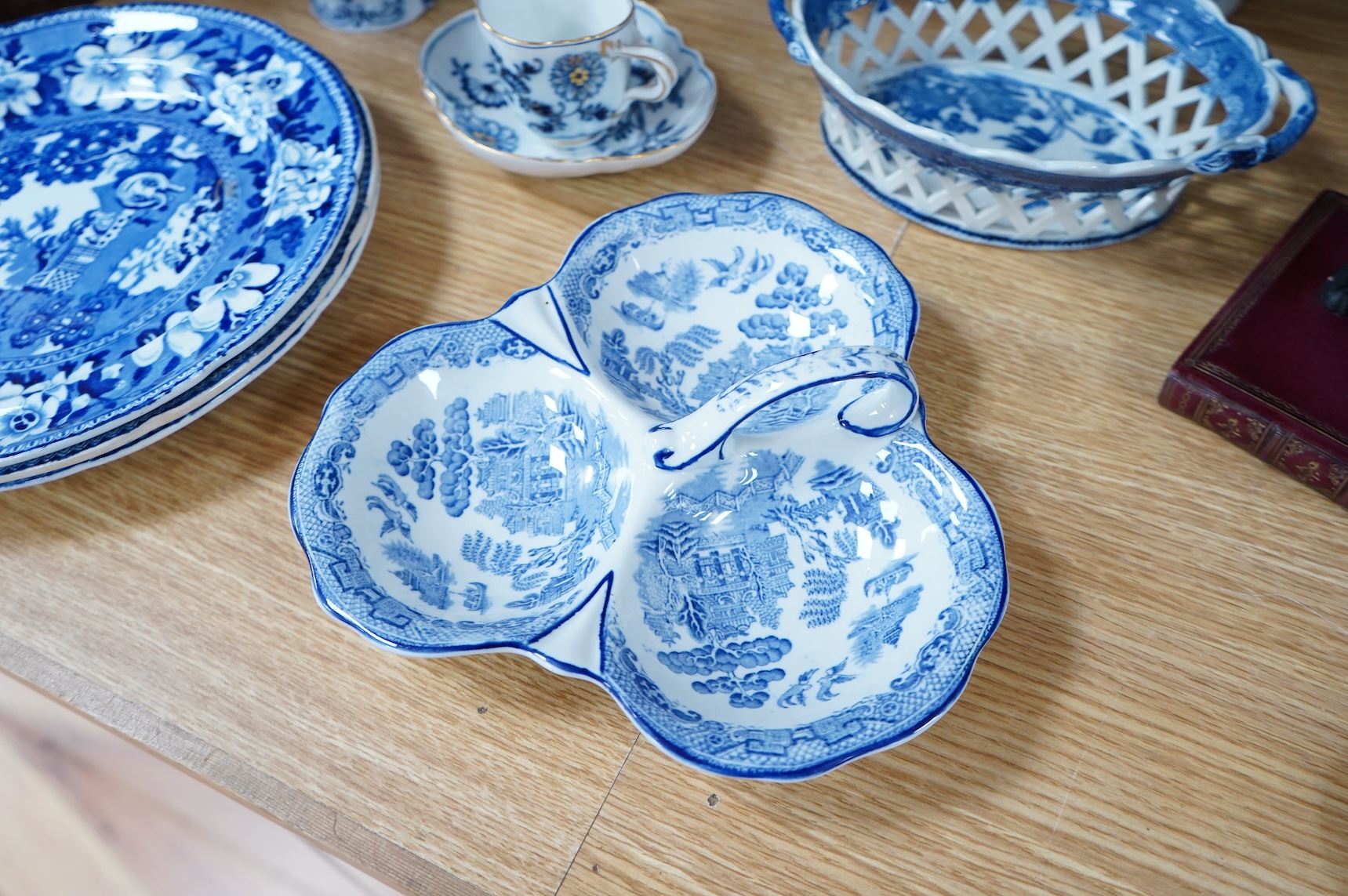 A group of blue and white Willow pattern china, 19th century and later and a Meissen cup and. Saucer. (12).